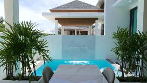 Bazén v ubytování Relax Nai Yang beach pool Villas nebo v jeho okolí