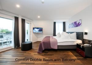 Katil atau katil-katil dalam bilik di Hotel Hottingen