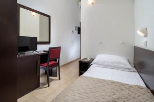 Postel nebo postele na pokoji v ubytování Union Park Hotel