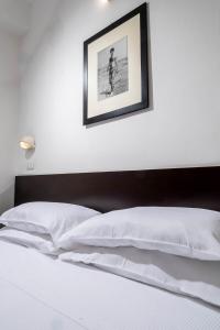 Postel nebo postele na pokoji v ubytování Union Park Hotel
