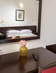 Postel nebo postele na pokoji v ubytování Union Park Hotel