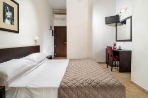 Postel nebo postele na pokoji v ubytování Union Park Hotel