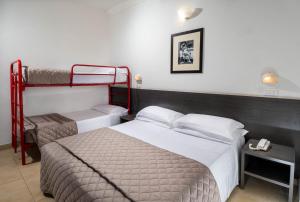 Postel nebo postele na pokoji v ubytování Union Park Hotel