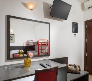 TV a/nebo společenská místnost v ubytování Union Park Hotel