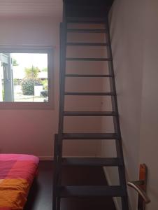 Una cama o camas en una habitación de T2 Charmant et calme