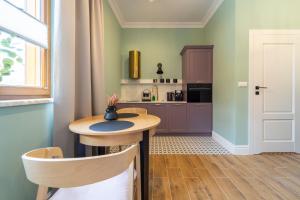 Kuchyň nebo kuchyňský kout v ubytování Apartamenty Galeria Trunków