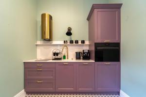 Kuchyň nebo kuchyňský kout v ubytování Apartamenty Galeria Trunków