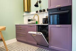 Kuchyň nebo kuchyňský kout v ubytování Apartamenty Galeria Trunków