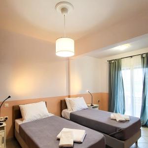 Katil atau katil-katil dalam bilik di Martaki House - Corfu Town