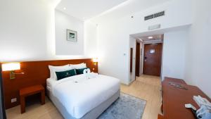 Postel nebo postele na pokoji v ubytování Acacia Hotel by Blue Collection