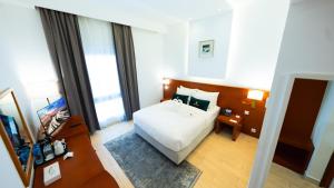 Postel nebo postele na pokoji v ubytování Acacia Hotel by Blue Collection