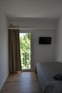Postel nebo postele na pokoji v ubytování Hotel Misty