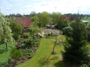 an aerial view of a garden with trees and flowers at Ferienwohnung Garmatter Hermannsburg in Hermannsburg +4 photos