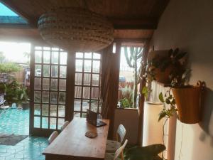 a room with a table with a laptop on it at Birds House in Casablanca
