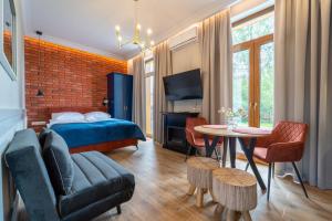 Postel nebo postele na pokoji v ubytování Apartamenty Galeria Trunków
