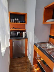 Kuchyň nebo kuchyňský kout v ubytování 4 Elements Apartments