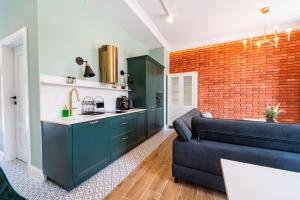 Kuchyň nebo kuchyňský kout v ubytování Apartamenty Galeria Trunków