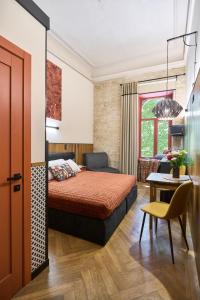 Postel nebo postele na pokoji v ubytování WOOD Design Aparthotel