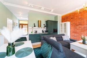Kuchyň nebo kuchyňský kout v ubytování Apartamenty Galeria Trunków