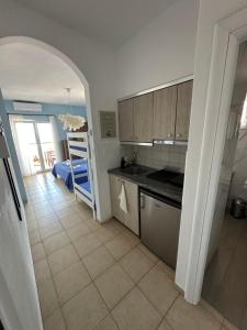 Imagen de la galería de La Scala family apartments, en Nea Roda