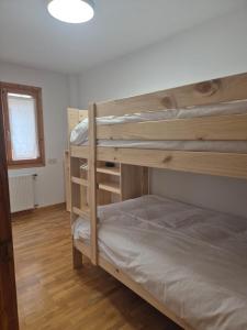 Ένα ή περισσότερα κρεβάτια σε δωμάτιο στο Apartamento Uxín