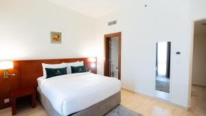 Postel nebo postele na pokoji v ubytování Acacia Hotel by Blue Collection