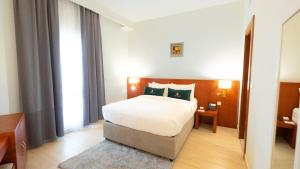Postel nebo postele na pokoji v ubytování Acacia Hotel by Blue Collection