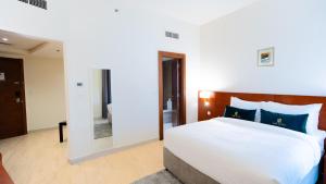 Postel nebo postele na pokoji v ubytování Acacia Hotel by Blue Collection