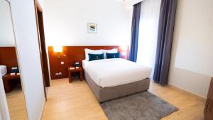 Postel nebo postele na pokoji v ubytování Acacia Hotel by Blue Collection