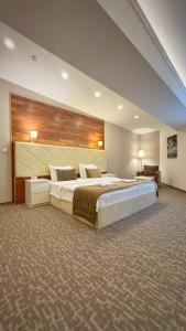 Postel nebo postele na pokoji v ubytování Luxury Rooms Skadarlija