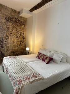 Ένα ή περισσότερα κρεβάτια σε δωμάτιο στο Casa dos Monges by PURUS