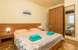 Postel nebo postele na pokoji v ubytování Apartments Villa Olga