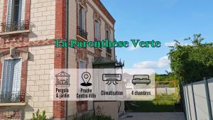 a sign on the side of a building at La Parenthèse Verte - Garden - Air conditioning - Near center in Romilly-sur-Seine