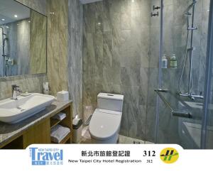 Koupelna v ubytování Yidear Hotel