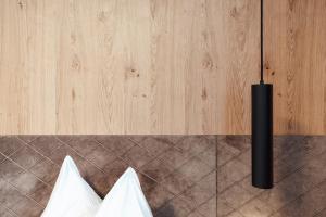 Llit o llits en una habitació de Hotel Tannenberg