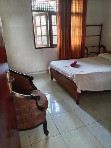 Postel nebo postele na pokoji v ubytování The Sanhida Guest House Colombo