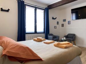 Postel nebo postele na pokoji v ubytování gite quend piscine chauffée + 10 fotografií