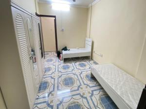 Giường trong phòng chung tại Female sharing room in city center +12 ảnh