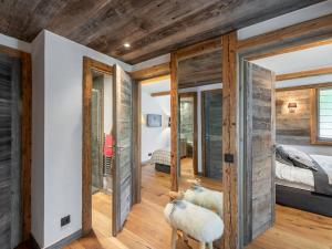 Posteľ alebo postele v izbe v ubytovaní Appartement chaleureux proche pistes de ski et golf à Megève - FR-1-569-67