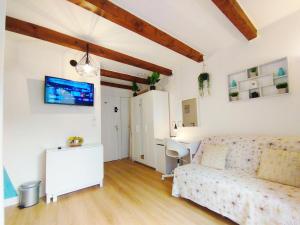 TV a/nebo společenská místnost v ubytování L'ESCALE AIXOISE - Centre Historique - 5min à pieds Cours Mirabeau - by experienceimmo + 37 fotografií