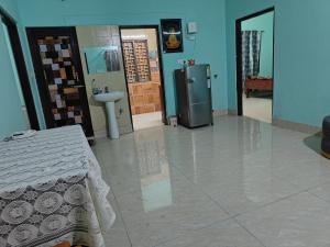 Μια τηλεόραση ή/και κέντρο ψυχαγωγίας στο Sai Krupa Home Stay