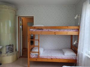 Postel nebo postele na pokoji v ubytování Södra Ljunga Vandrarhem
