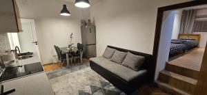 Postel nebo postele na pokoji v ubytování Apartman Zvijezda