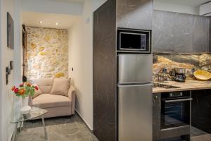 Kuchyň nebo kuchyňský kout v ubytování Anassa 14 Luxury One Bedroom Maisonette