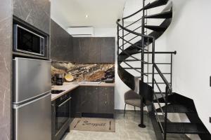 Kuchyň nebo kuchyňský kout v ubytování Anassa 14 Luxury One Bedroom Maisonette