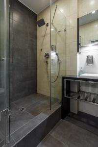 Kúpeľňa v ubytovaní Barkar ArCadia Apartments + 17 fotografií