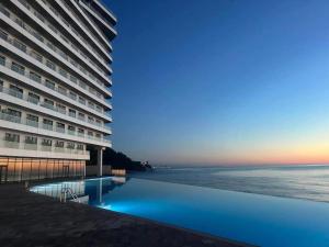 Bazén v ubytování ბამბუ ბიჩ ციხისძირი bamboo beach tsikhisdziri nebo v jeho okolí