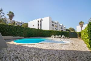 Πισίνα στο ή κοντά στο Salgados Beach House
