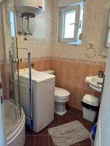 Koupelna v ubytování Tijana Apartments + 29 fotografií