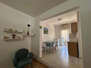 Kuchyň nebo kuchyňský kout v ubytování Tijana Apartments